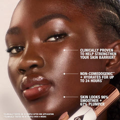 قلم أساس مرطب شفاف لامع من شارلوت تيلبوري أنريل سكين